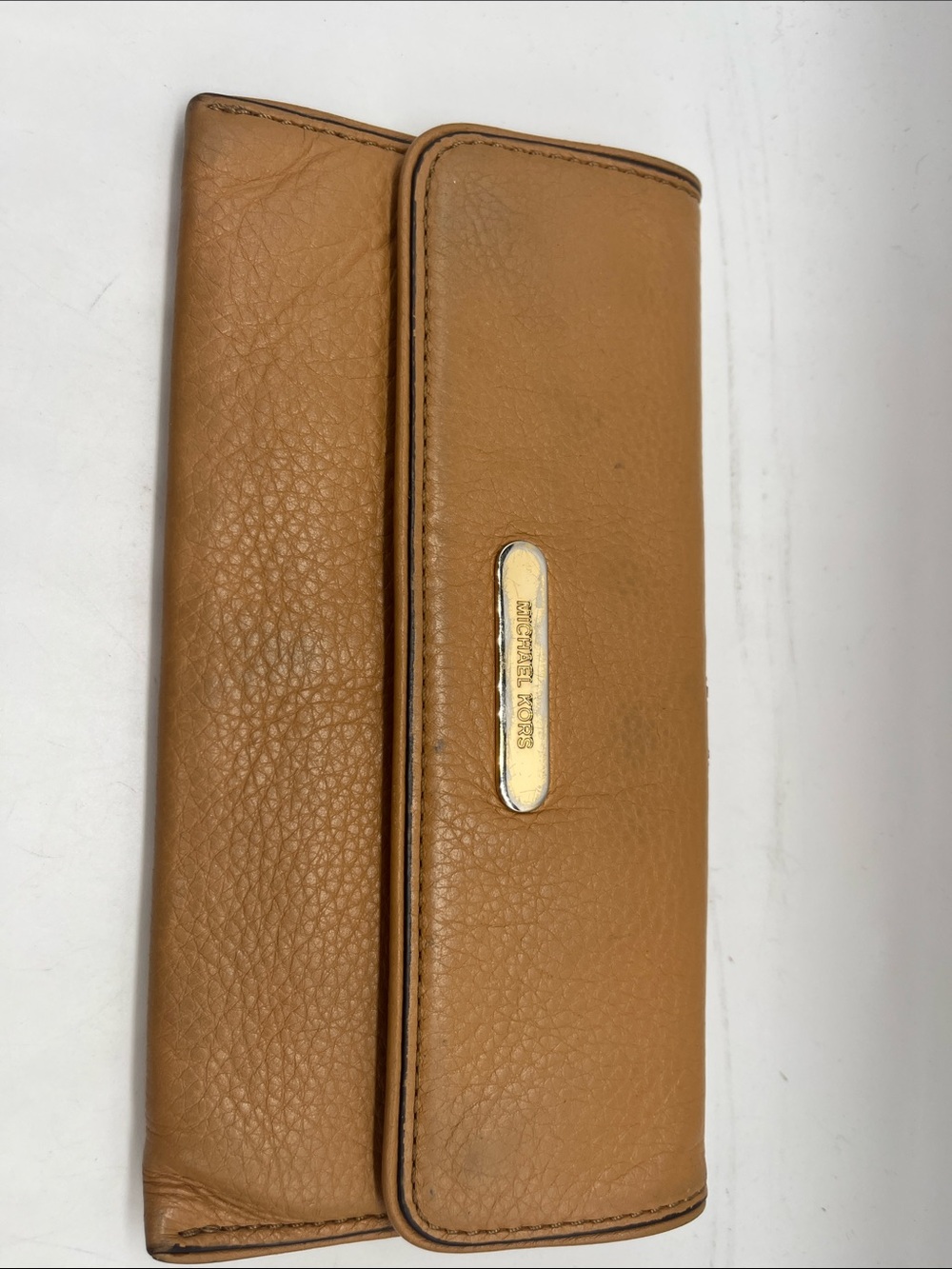 Michael Kors Flat wallet Tan Snap front  One slip pocket and 4 CC slots Back Zip